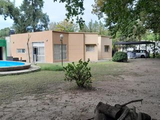 VENTA/PERMUTA - Casa - Tres Dormitorios - Jardín parquizado - Los Aromos, Roldan