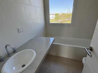 Foto 11 de Casa a estrenar en El Canton Golf con Pileta