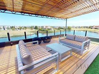 Foto 3 de Casa en Venta Puertos del Lago con vista a la laguna Barrio Los Ceibos
