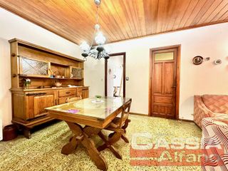 Foto 3 de CHALET INGLES EN ESQUINA, LOTE 231m2, DOS DORMITORIOS, JARDIN, GARAGE, CTO.ENCERES, BAULERA 2 BAÑOS