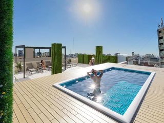 Foto 5 de 2 Amb piso alto / Piscina Deck solarium SUM Terrazas con parrillas y duchas Bike Parking Cocheras