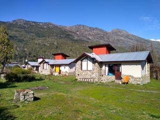 Foto 1 de Lago Puelo,Villa del Lago complejo de 3 cabañas, amplio lote de 2.000 m2 valor usd 255.000.-