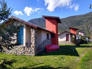 Foto 2 de Lago Puelo,Villa del Lago complejo de 3 cabañas, amplio lote de 2.000 m2 valor usd 255.000.-
