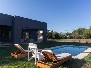 Foto 1 de Casa nueva en barrio privado de Lobos
