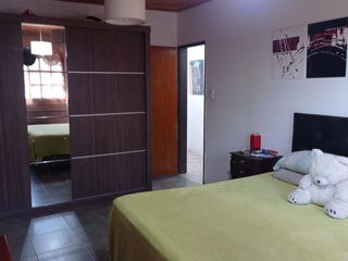 Foto 25 de Casa en venta - 5 dormitorios 2 baños - 208mts2 - Villa Elisa [FINANCIADO]