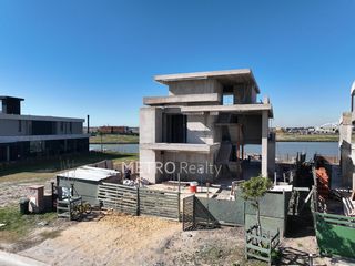 Foto 18 de Casa en venta al lago con 5 habitaciones en suite en Los Puentes, Nordelta