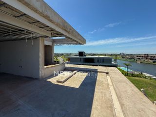 Foto 11 de Casa en venta al lago con 5 habitaciones en suite en Los Puentes, Nordelta
