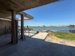 Foto 6 de Casa en venta al lago con 5 habitaciones en suite en Los Puentes, Nordelta