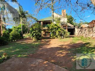 Foto 1 de Se vende casa amplia sobre Ruta 12 frente a Mercado Central - Posadas
