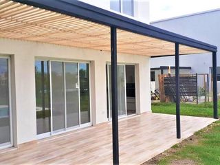 Foto 2 de VENTA CON RENTA, CASA en El Canton - Escobar IMPECABLE