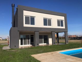 Foto 2 de Casa a estrenar en exclusivo barrio Ceibos de Puertos del Lago