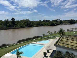 Foto 1 de Hogar Frente Al Río: Confort, Vistas Únicas y un Estilo de Vida Exclusivo