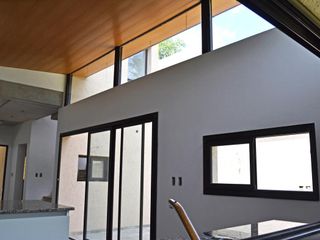 Foto 14 de Venta Casa 3 Dorm. Desarrollada en 2 plantas. Cochera. Importante Patio verde arbolado .  Funes