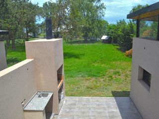 Foto 7 de Venta Casa 3 Dorm. Desarrollada en 2 plantas. Cochera. Importante Patio verde arbolado .  Funes