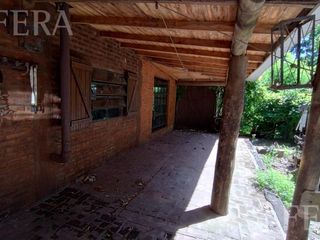 Foto 4 de Venta de casa quinta de 3 ambientes con jardín en Arturo Segui