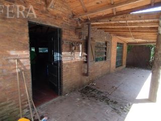 Foto 6 de Venta de casa quinta de 3 ambientes con jardín en Arturo Segui