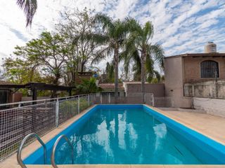 Foto 33 de VENTA CASA CON PILETA CUATRO DORMITORIOS EN FUNES