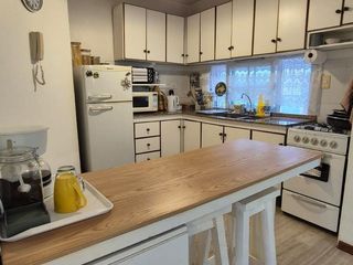Foto 7 de IMPERDIBLE DEPARTAMENTO EN VENTA DE 2 DORMITORIOS CON PISCINA Y JARDÍN DE USO EXCLUSIVO.-
