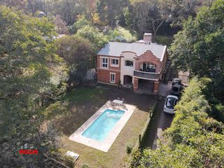 Foto 2 de Casa en venta de 4 dormitorios c/ cochera en Los Perales