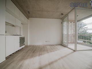 Foto 1 de Departamento monoambiente al c/frente con balcón y amenities