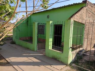 Foto 2 de SE VENDE CASA. AVENIDA GARDEL ESQUINA 32 BÂ° NUEVO