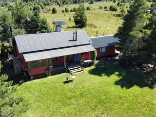 Foto 1 de VENTA CASA 4 AMBIENTES + CABAÑA 3 AMBIENTES + QUINCHO - B° QUILQUIHUE - SAN MARTIN DE LOS ANDES