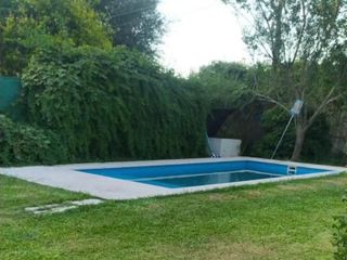 Foto 5 de Alquiler - Casa dos dormis, pileta y jardín en Roldán