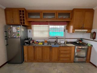 Foto 3 de VENTA CASA 4 AMB CON GARAGE Y JARDIN EL TALAR
