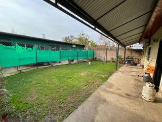 Foto 6 de VENTA CASA 4 AMB CON GARAGE Y JARDIN EL TALAR