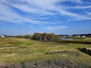 Foto 4 de Venta Casa 5 Dormitorios con Pileta y vista al Golf sobre golf y laguna en La Calesa Pilará