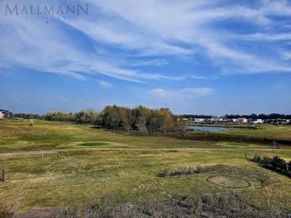 Foto 25 de Venta Casa 5 Dormitorios con Pileta y vista al Golf sobre golf y laguna en La Calesa Pilará