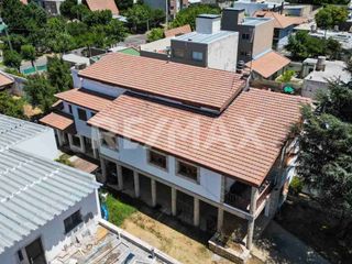 Foto 32 de VENTA CASA 5 DORMITORIOS /LOTE APTO COMERCIAL, NQN