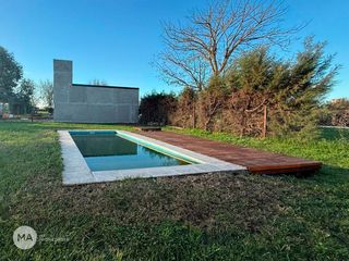 Foto 27 de Casa 3 Dormitorios con amenities y Gas - Bouchard 300 - Funes | Alquiler