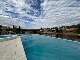Foto 2 de VENTA CASA AMOBLADA  CARLOS PAZ CON BAJADA AL LAGO