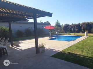 Foto 22 de Casa 3 Dormitorios Jardín y Piscina - Cantegril - Funes | Alquiler