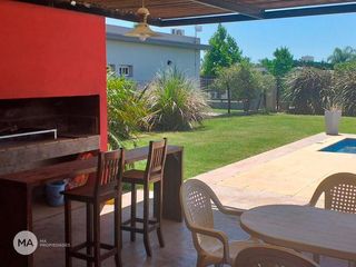 Foto 18 de Casa 3 Dormitorios Jardín y Piscina - Cantegril - Funes | Alquiler