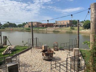 Foto 2 de CASA EN VENTA AL LAGO EN BARRIO EL CANTON ISLAS - MAROTO PROPIEDADES