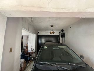 Foto 24 de Casa de tres ambientes con cochera y jardin a la venta en Quilmes