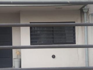 Foto 1 de DEPARTAMENTO 2 AMBIENTES CON PATIO Y COCHERA