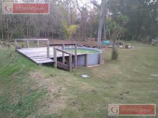 Foto 11 de Alquiler Semanal   Unica casa a orillas del arroyo gran parque , amoblada, parrilla fogon galeria  s/ predio de 3000 m2
