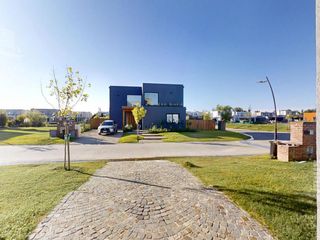 Foto 61 de Venta- Casa de 6 ambientes- galería, jardín en Laguna Grande, Villa Nueva