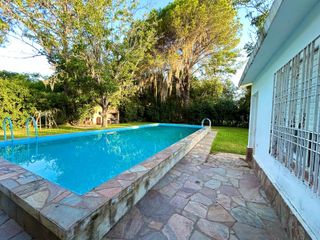 Foto 1 de Venta Casa  Funes garita 14 2 dormitorios piscina jardín parquizado