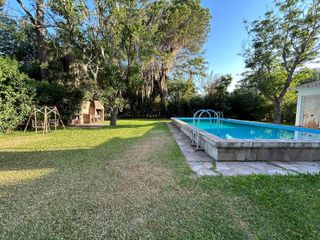 Foto 2 de Venta Casa  Funes garita 14 2 dormitorios piscina jardín parquizado