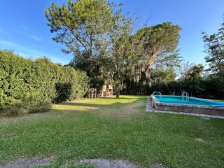 Foto 4 de Venta Casa  Funes garita 14 2 dormitorios piscina jardín parquizado