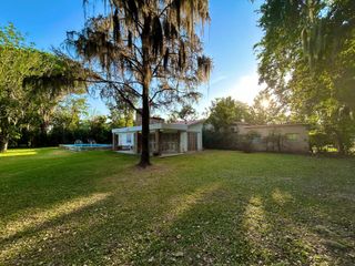 Foto 14 de Venta Casa  Funes garita 14 2 dormitorios piscina jardín parquizado