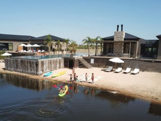 Foto 1 de Terreno en  OPORTUNIDAD LOTE AL RIO EN NAUDIR AGUAS PRIVADAS
