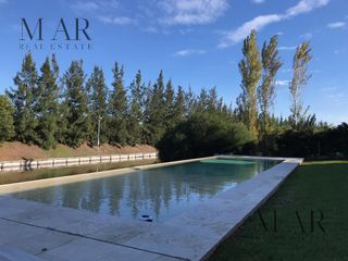 Foto 24 de Casa en Venta en Cabos del Lago, Nordelta. Salida a la laguna