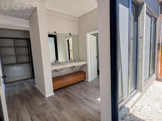 Foto 27 de Venta Casa - Barrio El Millord / Pilara - Vista a cancha de polo