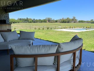 Foto 41 de Venta Casa - Barrio El Millord / Pilara - Vista a cancha de polo