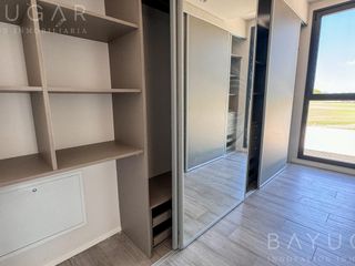 Foto 25 de Venta Casa - Barrio El Millord / Pilara - Vista a cancha de polo